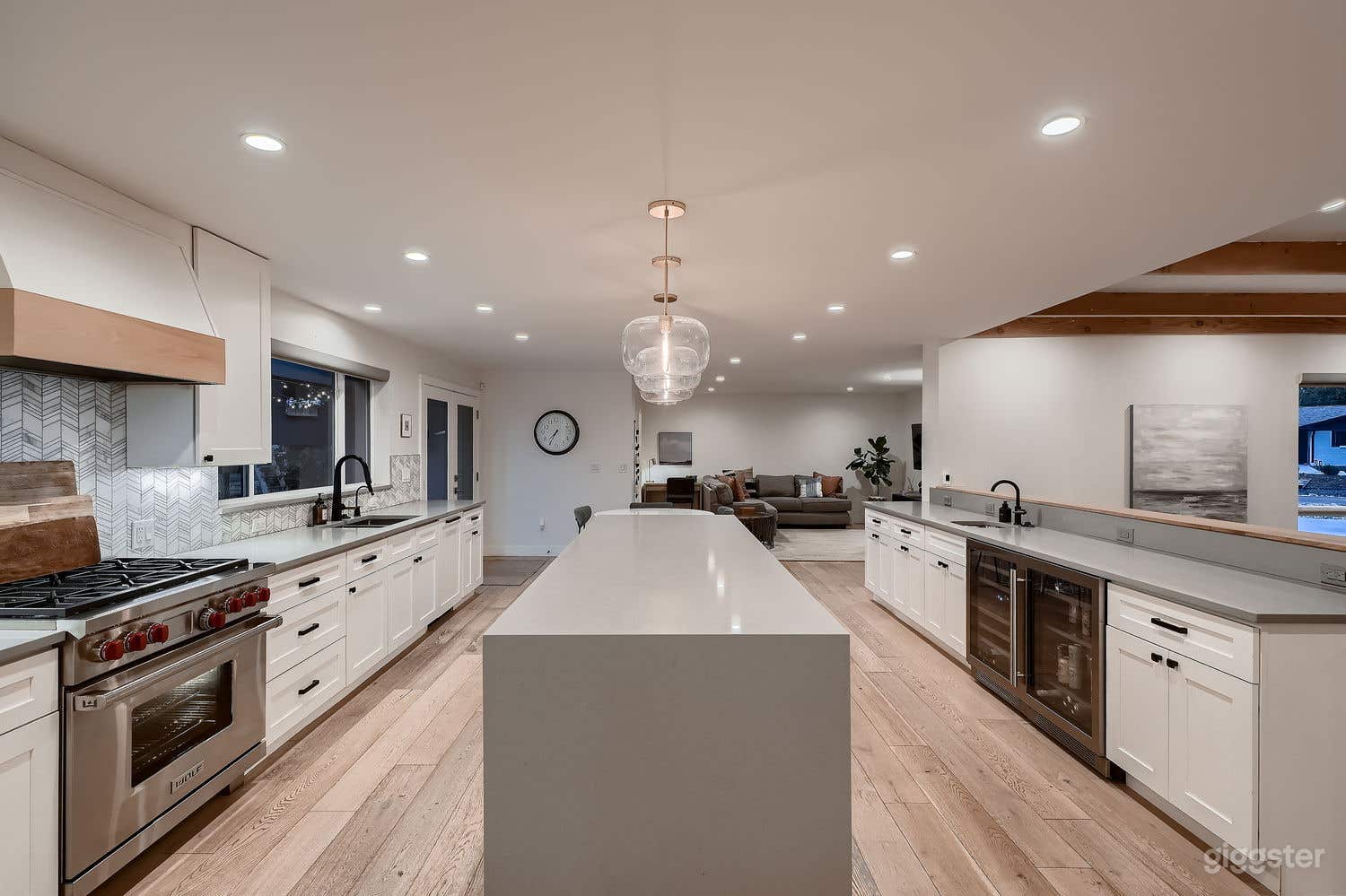 Large luxury kitchen with adjacent dining and family room.