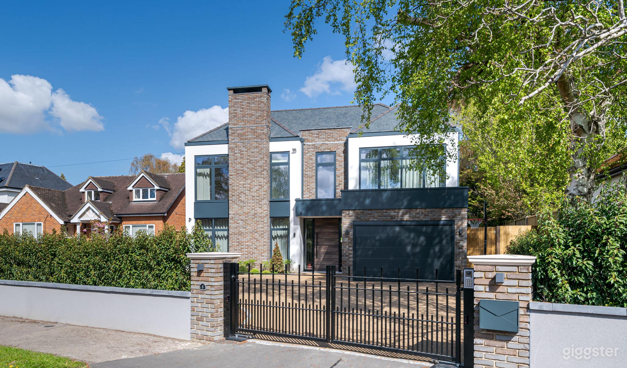 Architecturally-Designed Home With Pool and Garden Photo 2