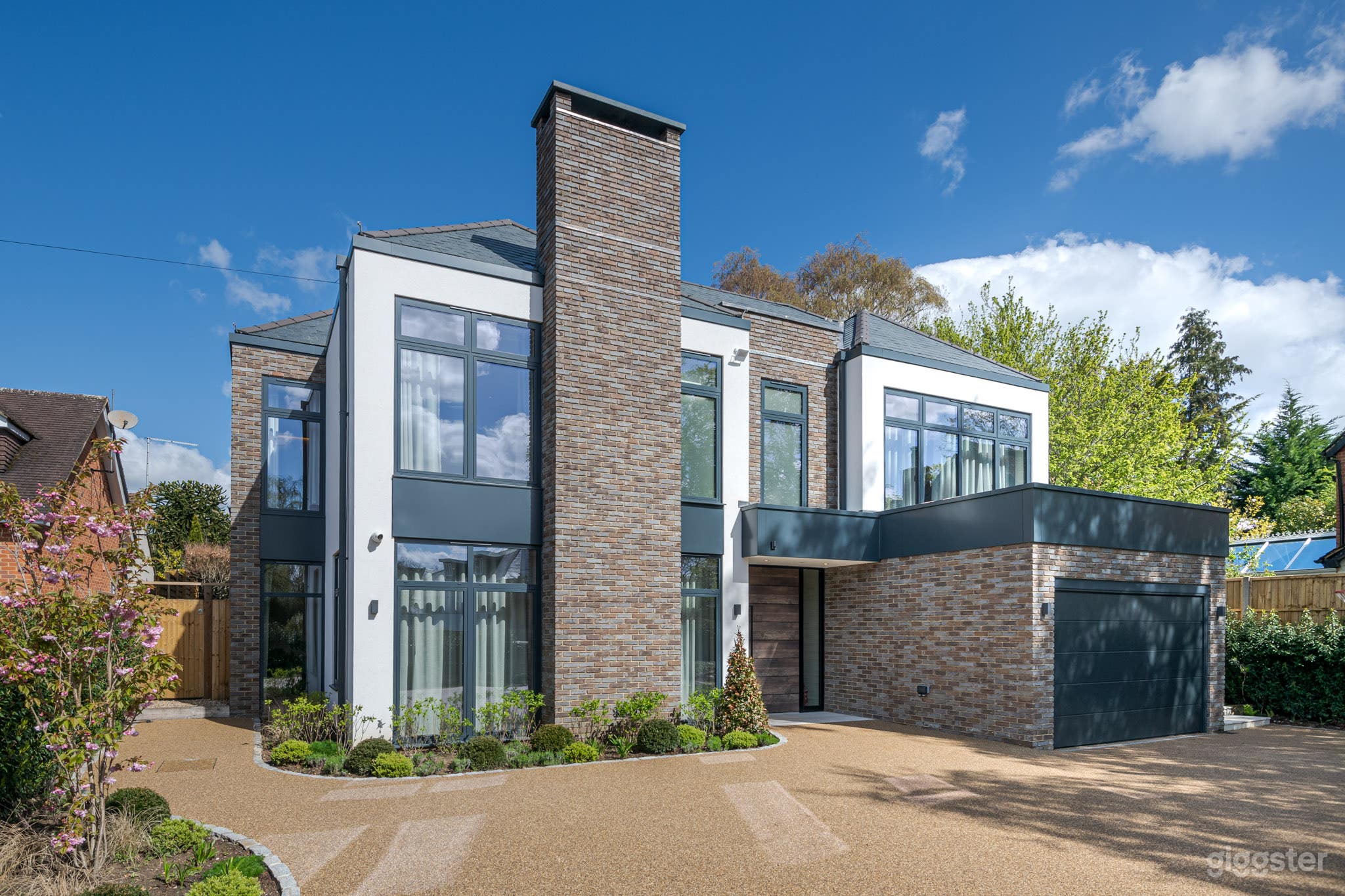 Architecturally-Designed Home With Pool and Garden Photo 4