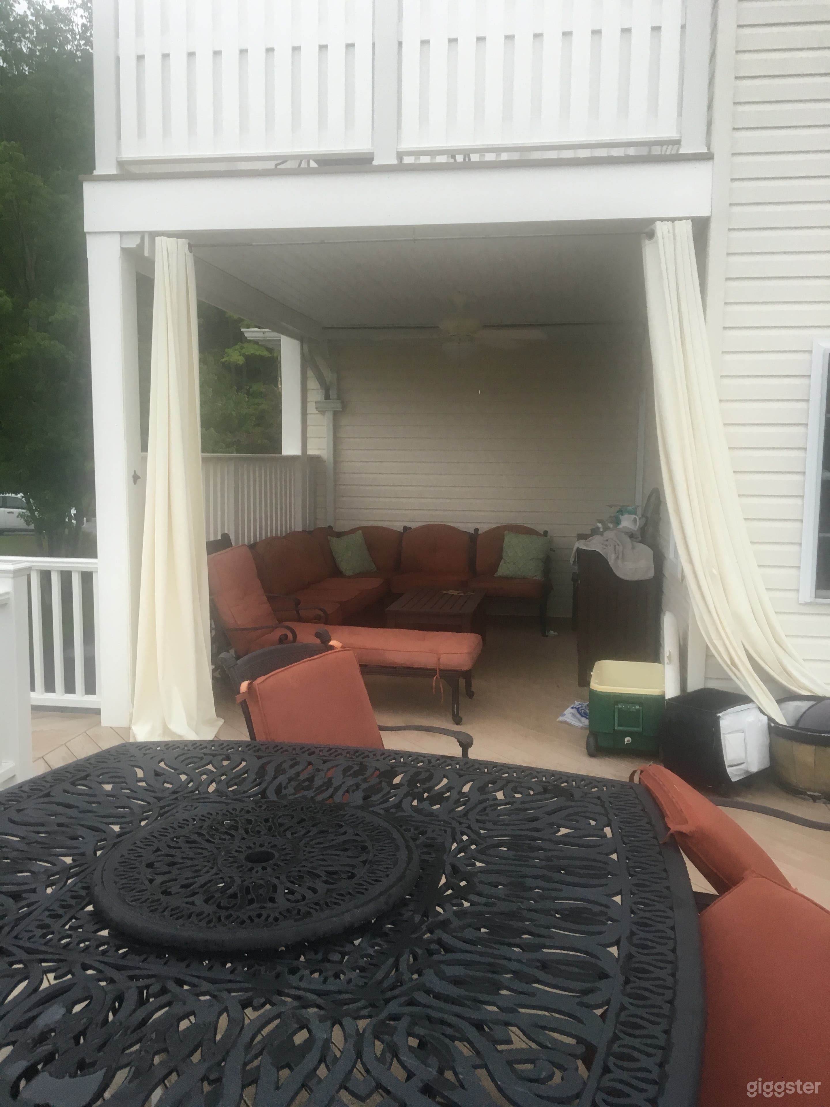 Private nook just off large deck with privacy outdoor curtains