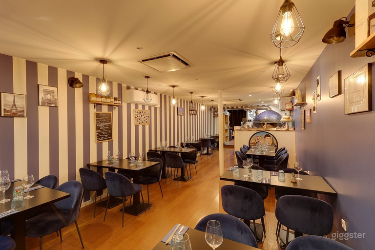 Pizzería y restaurante urbano animado con cocina abierta 