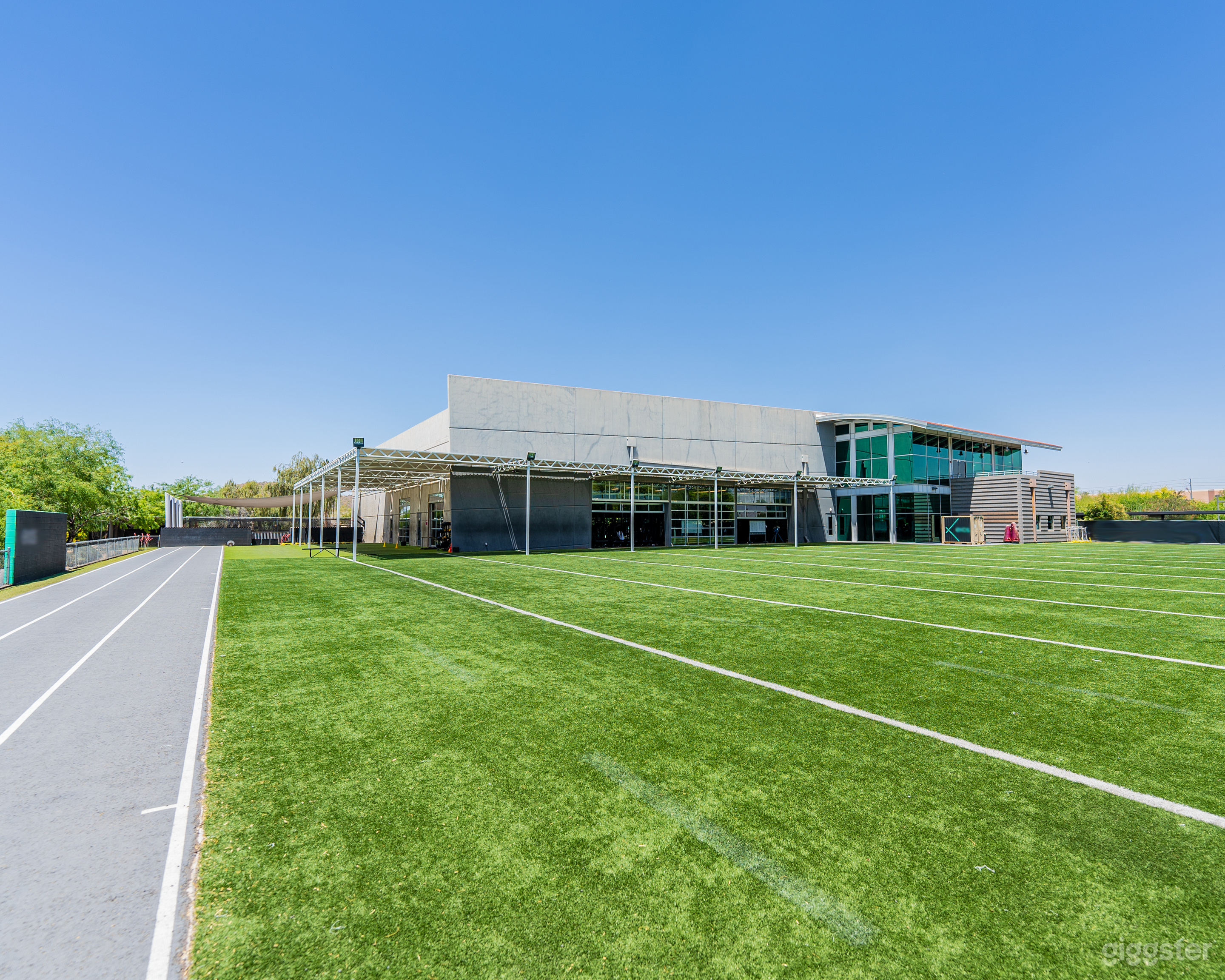 65 yd x 35yd turf connected to gym with 2 track lanes.