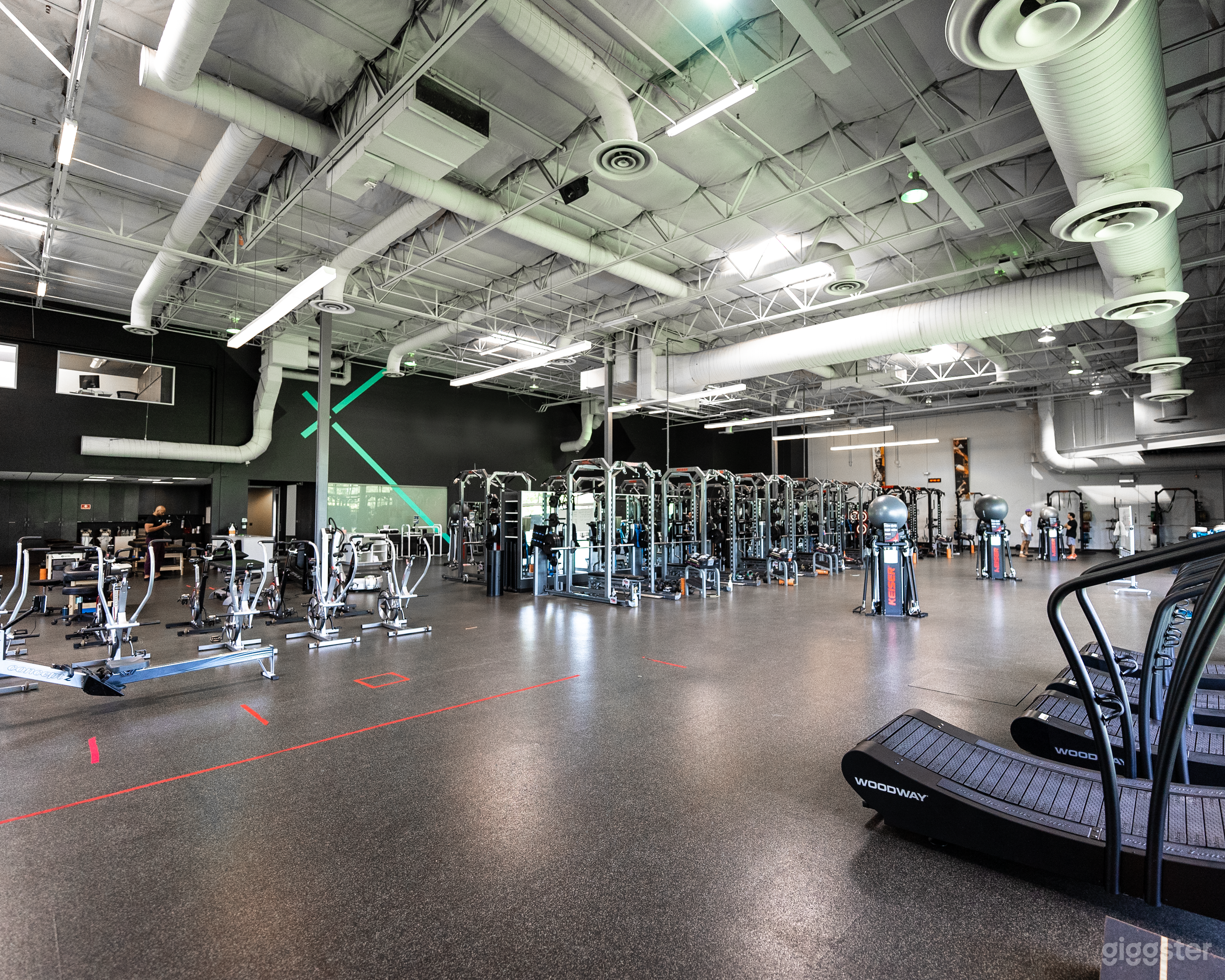 18 squat racks, 15 sets of dumbbells, 6 cable stations, multiple treadmills and bikes, plenty of bands, kettlebells, and other equipment as well.