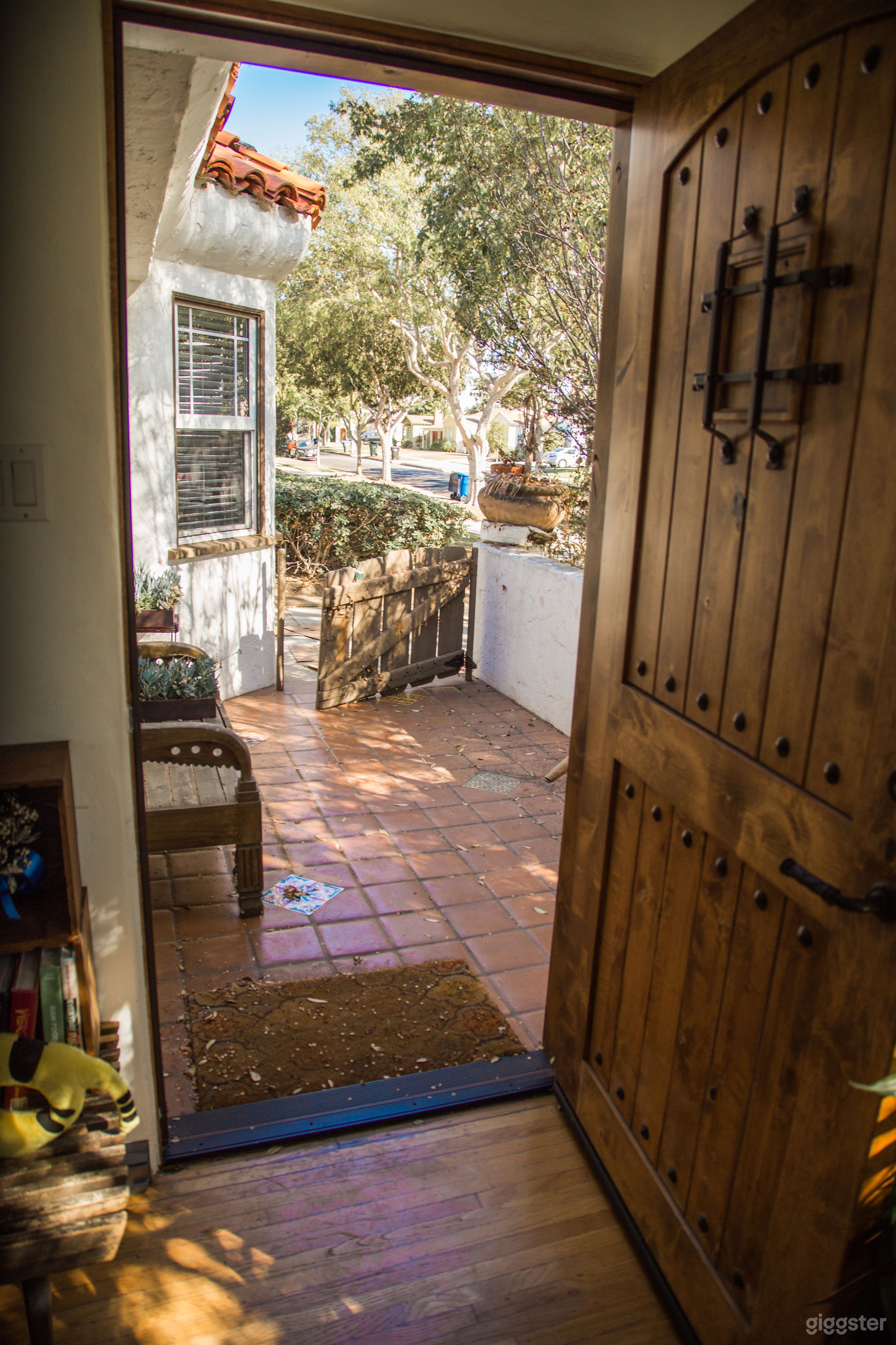 Bohemian Spanish Cottage with Huge Backyard Photo 1