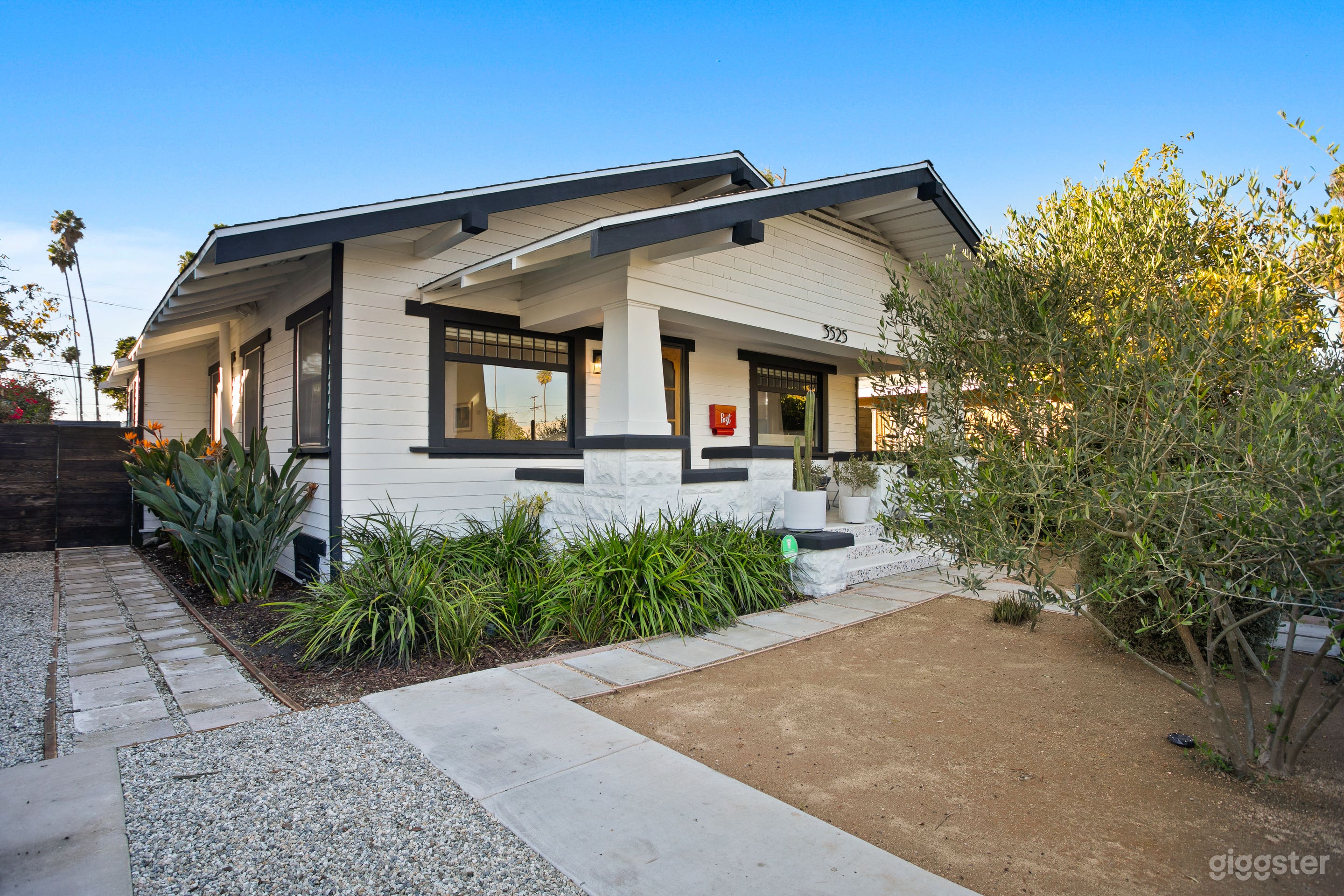 Front yard and pathway to the back yard. + 1 Parking spot in the front. 
