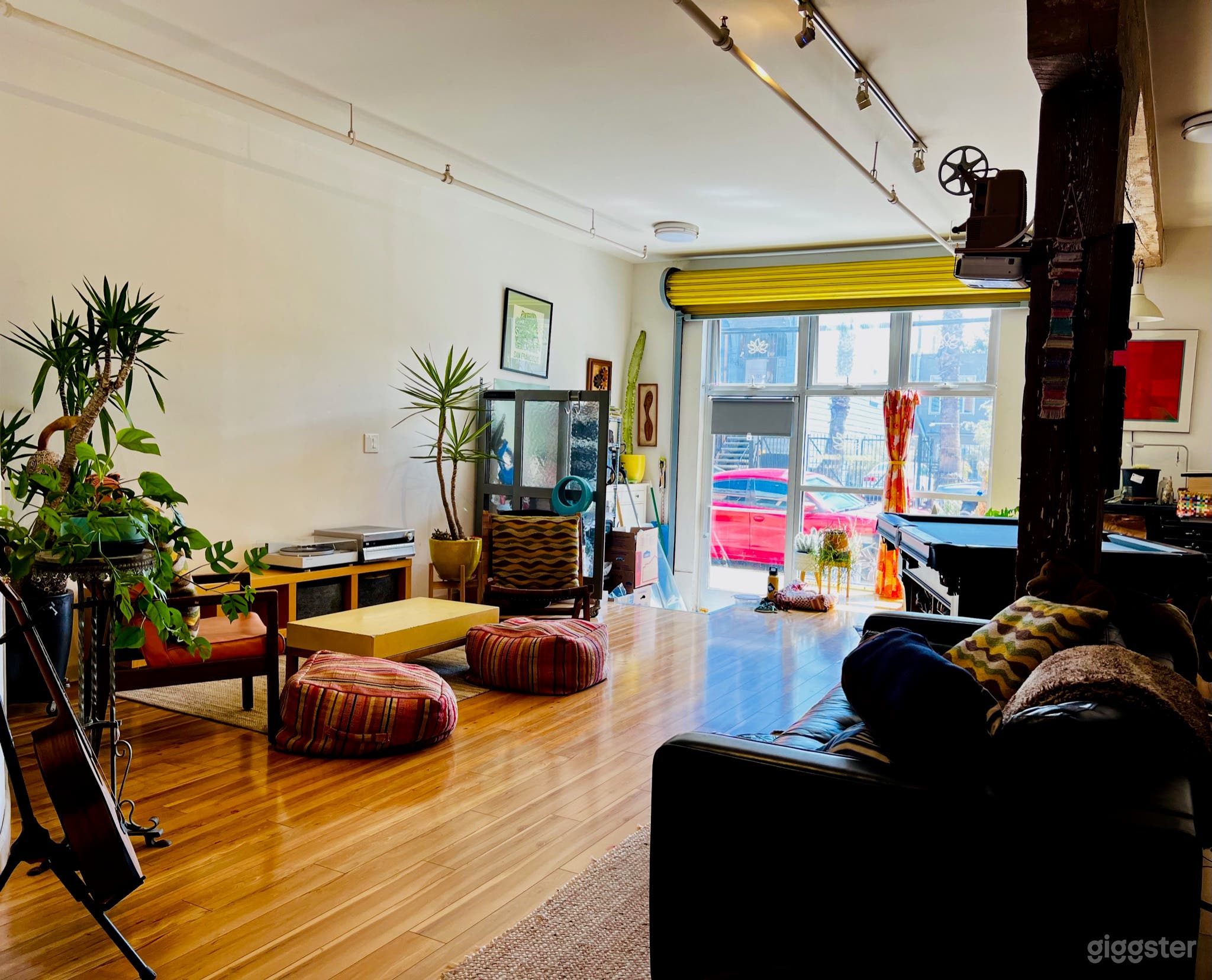 Lounging Area and Front Shop Window and Door with Garage Roller Door