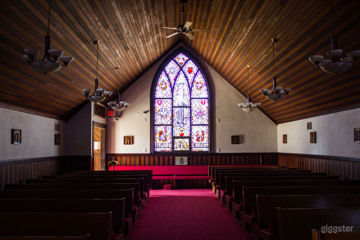 Church interior with North-West facing stained glass
