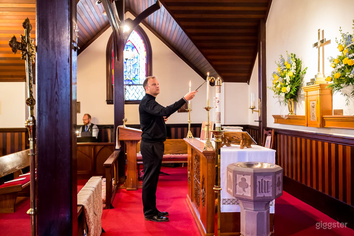 Church altar with North-East facing stained glass window