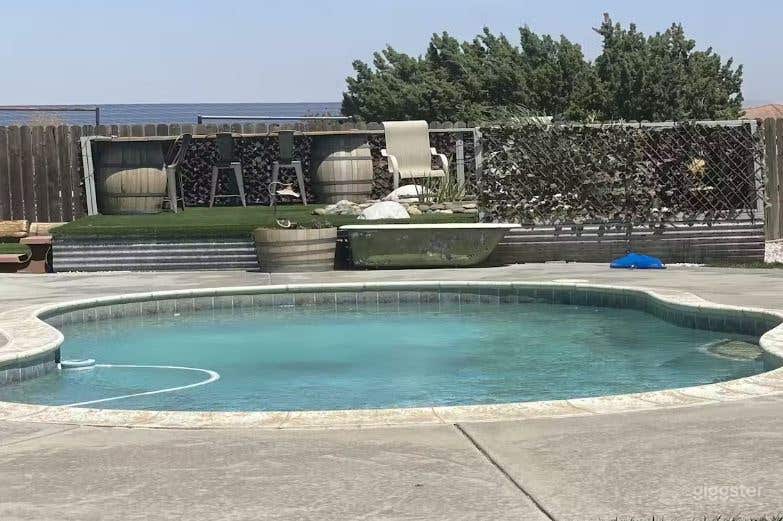 Refreshing Pool with Grassy Area  Photo 2