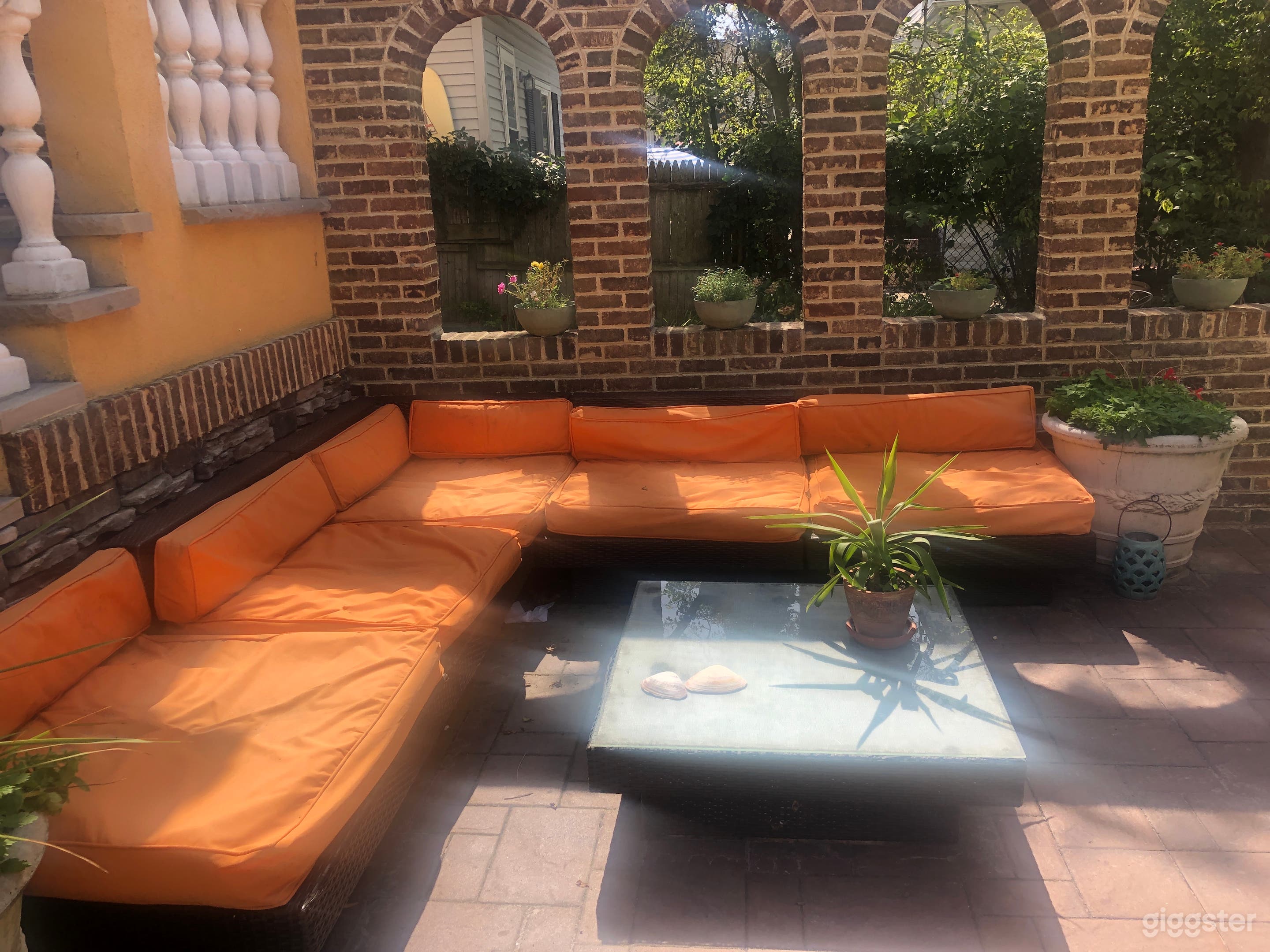 Backyard With Beautiful Relaxing Area Photo 4