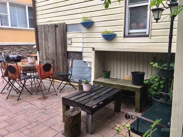 Backyard With Beautiful Relaxing Area Photo 3