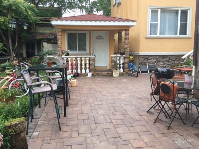 Backyard With Beautiful Relaxing Area Photo 1