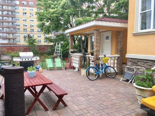 Backyard With Beautiful Relaxing Area Photo 2