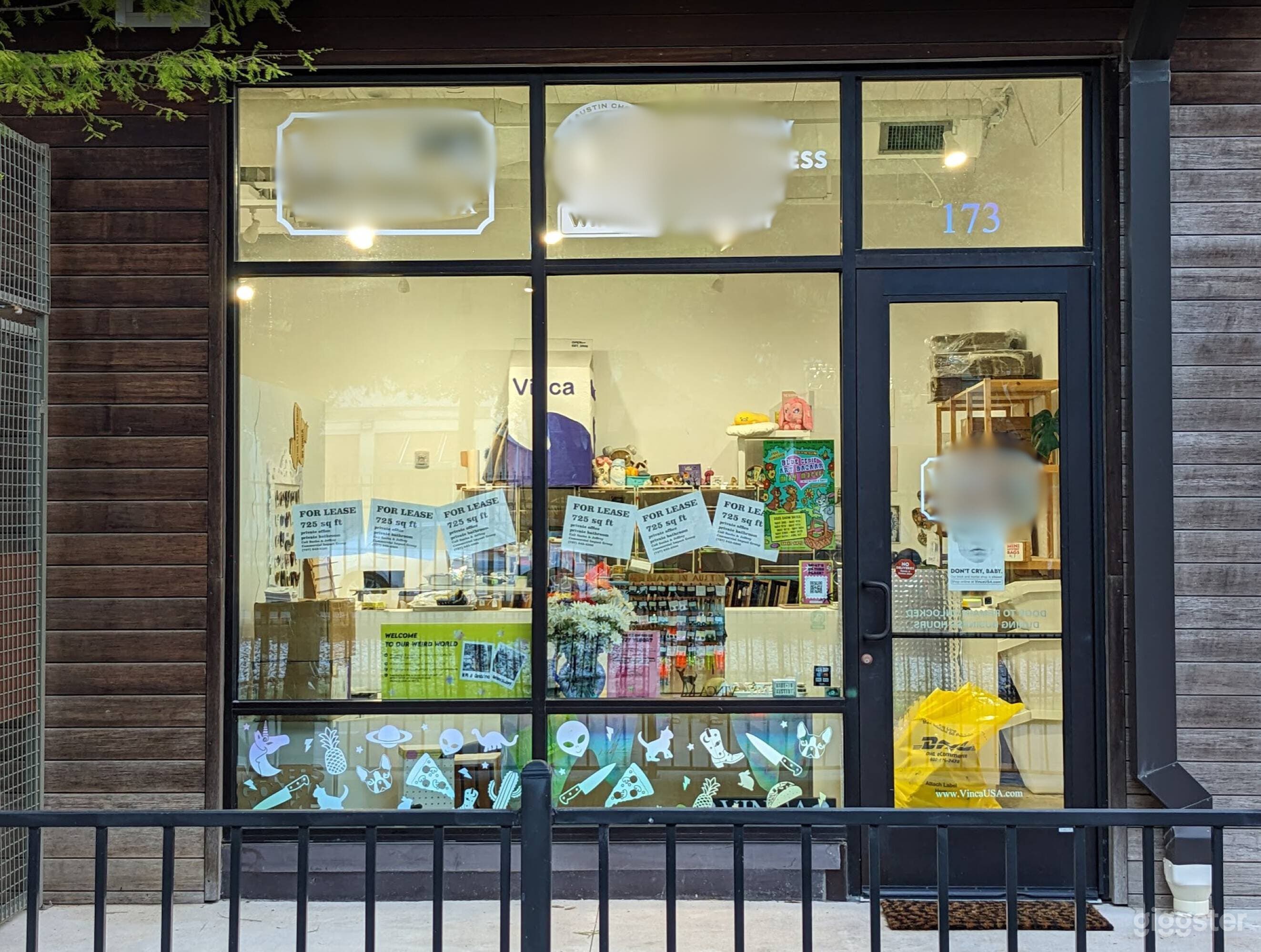 Sleek All-White Creative Space with Concrete Floors Photo 2