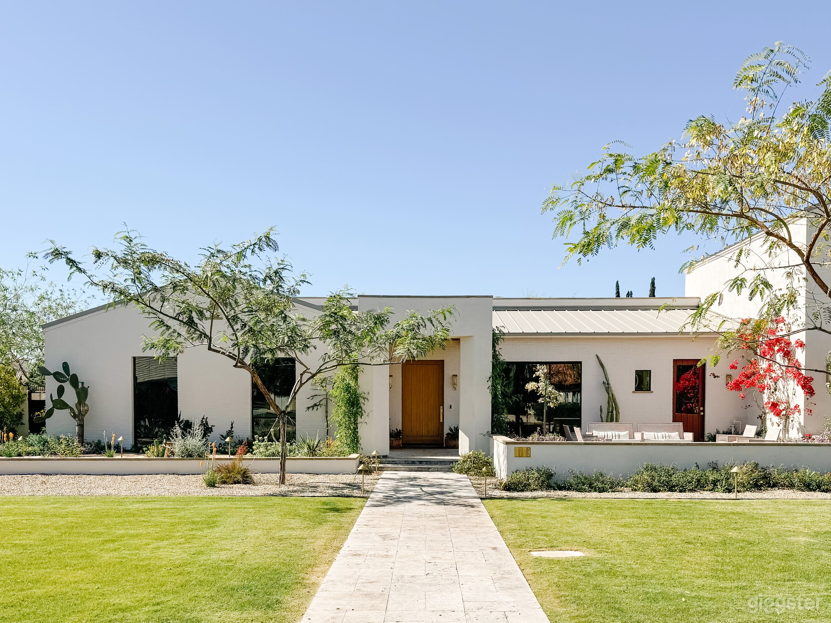 Warm Modern Home with Lush Landscaped Yard Photo 2