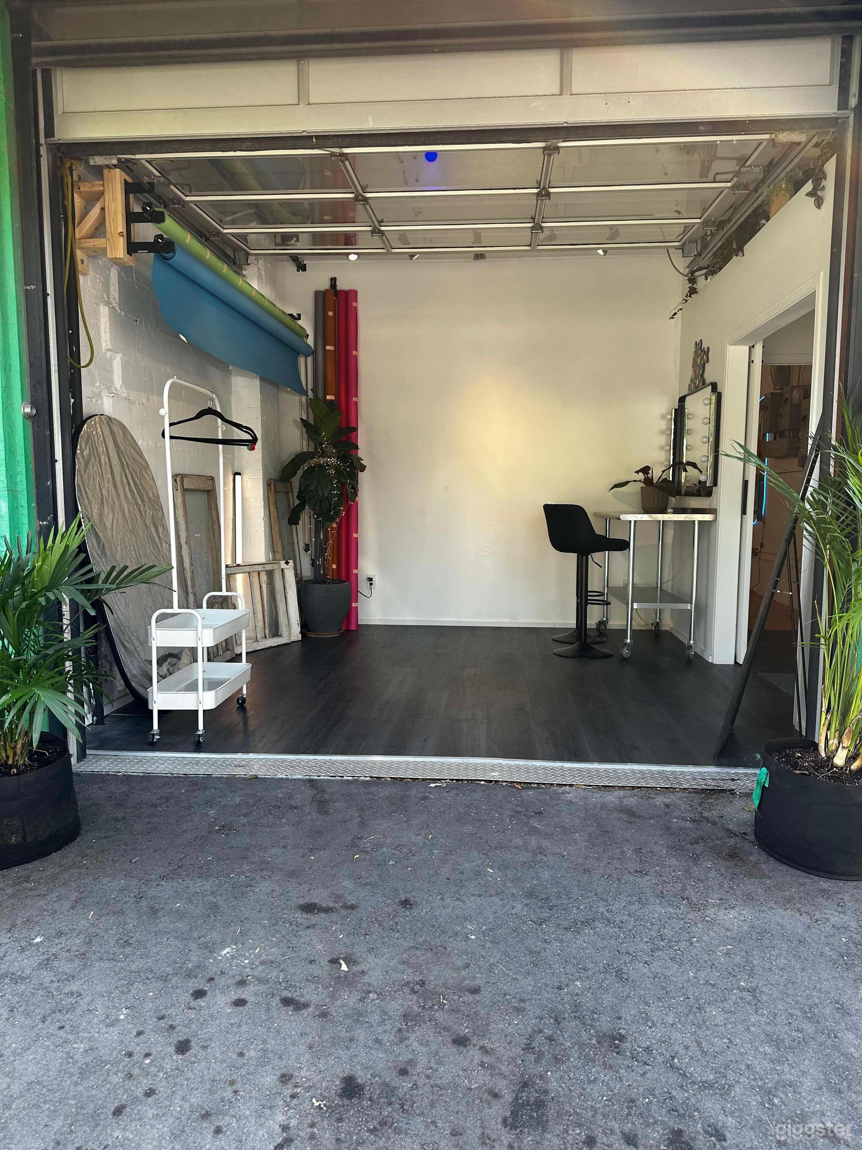 Room 123 - Room 1 with garage door open.