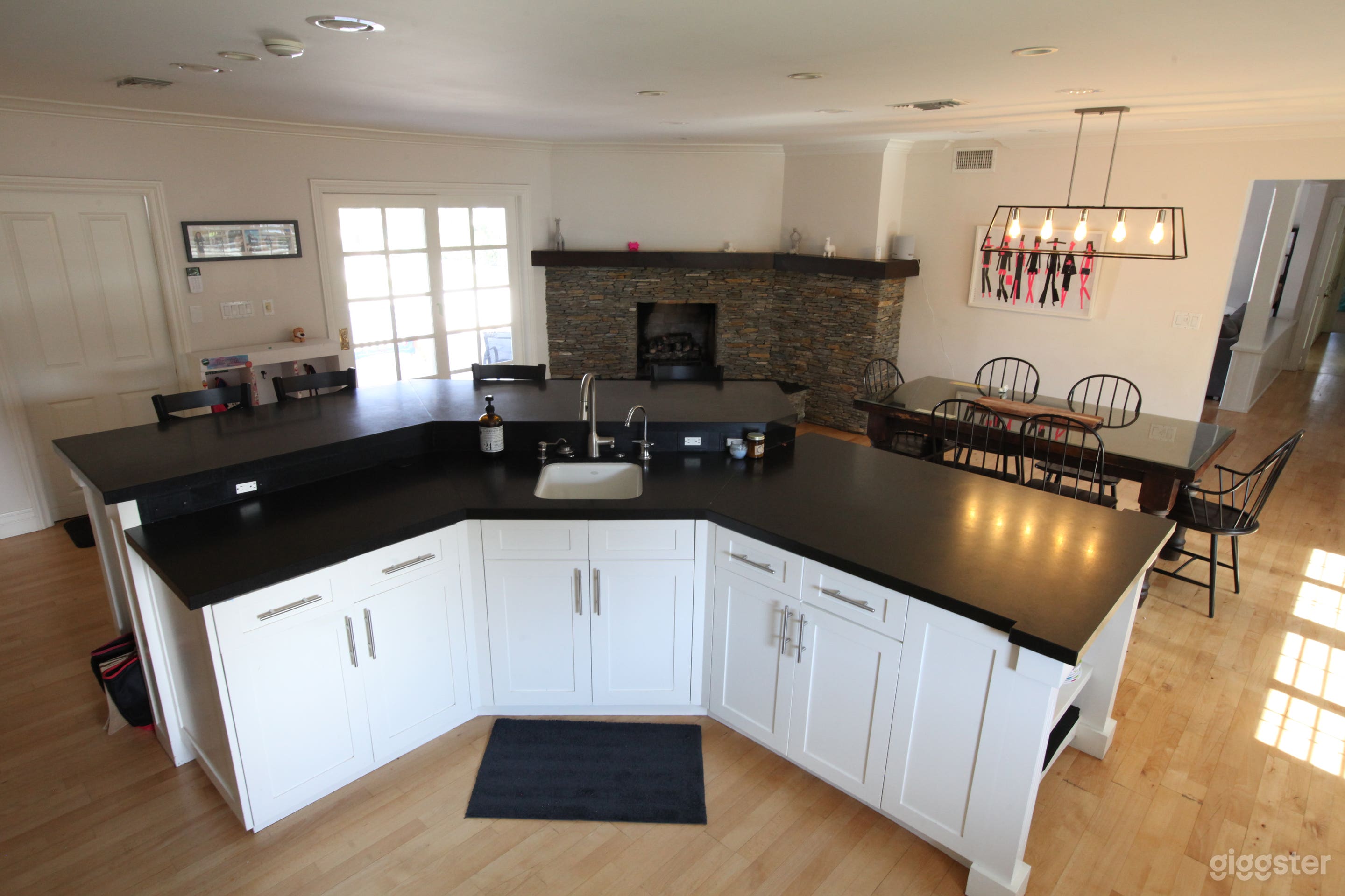 Expansive eat in kitchen with breakfast bar. Fireplace. 