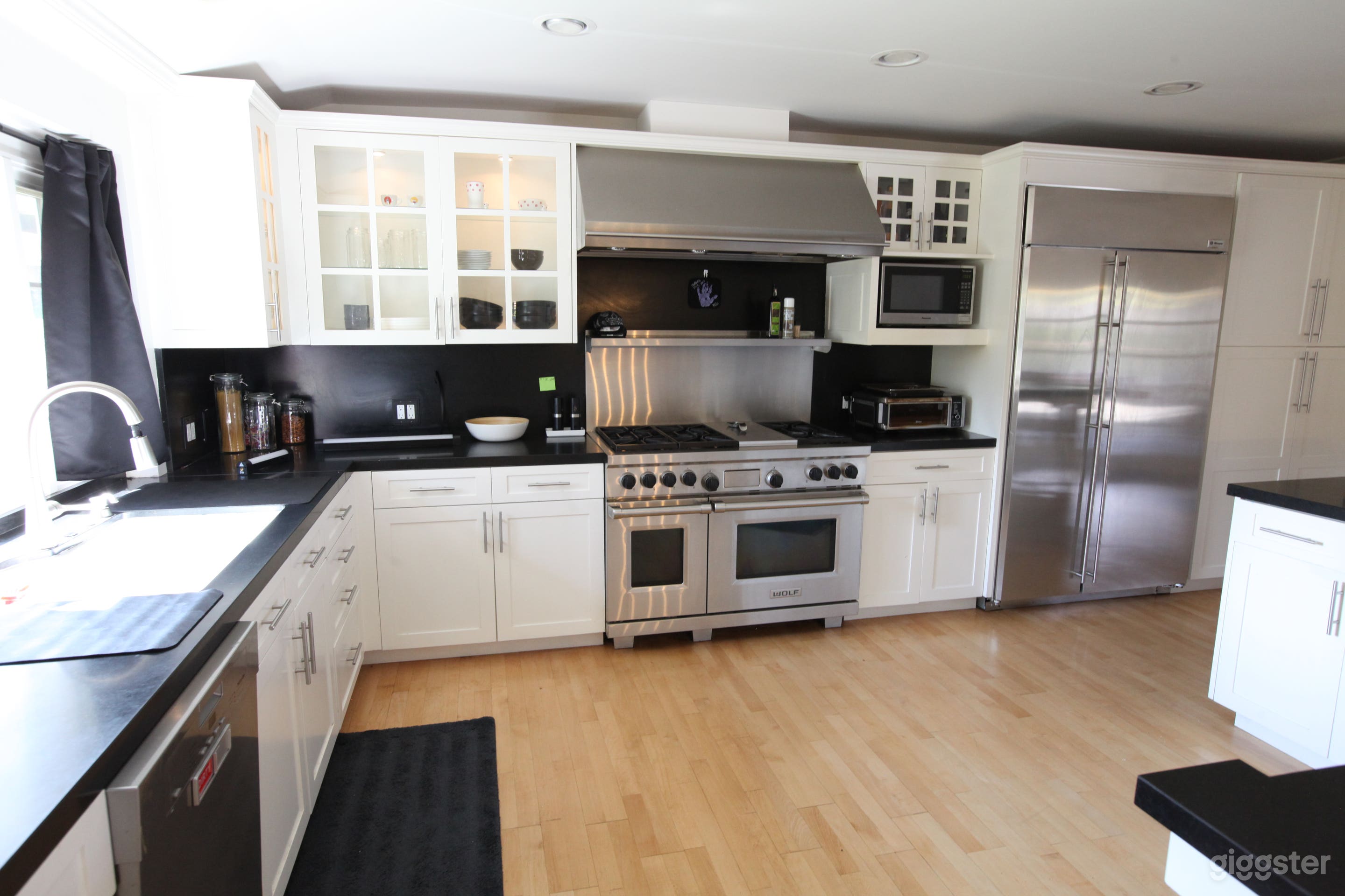 Expansive eat in kitchen with breakfast bar. Fireplace. 