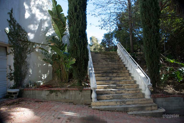  Exterior Stairwell leading to landing in between floor 2 and 3 to the front door  