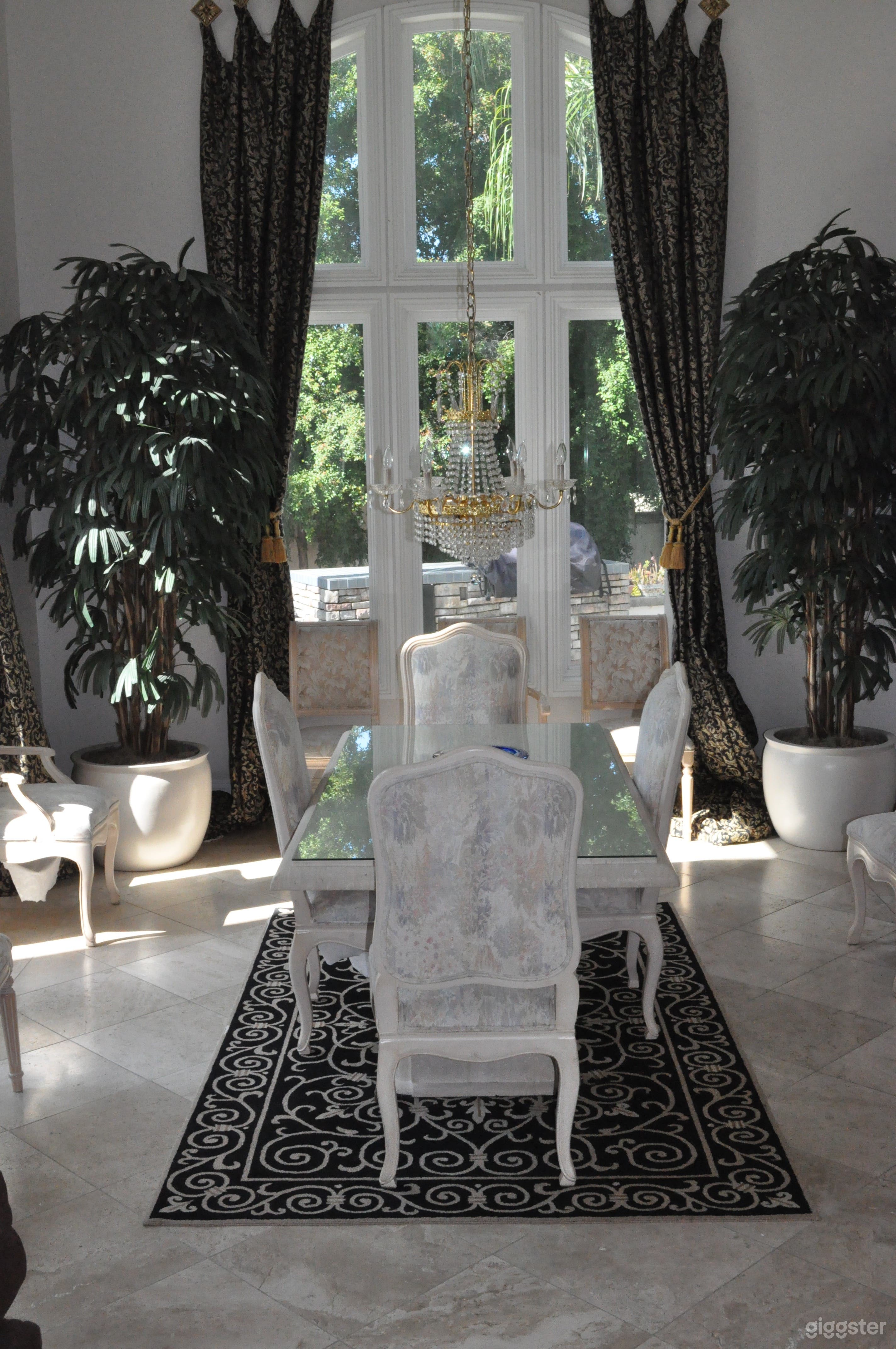 Formal Dining Room with two stories ceilings High ceilings 
