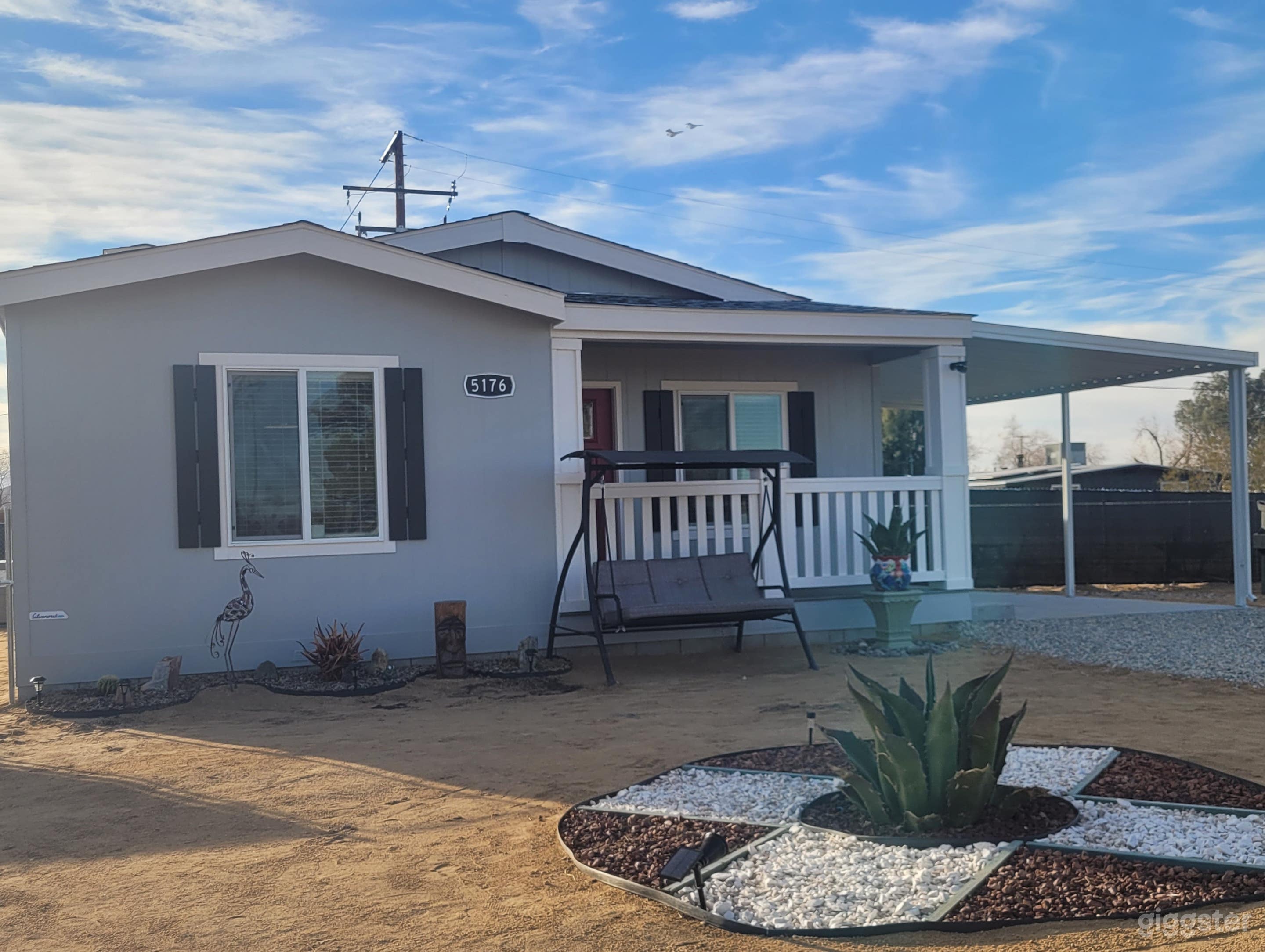 Newly constructed home in a desert environment with mountain views and no houses on either side