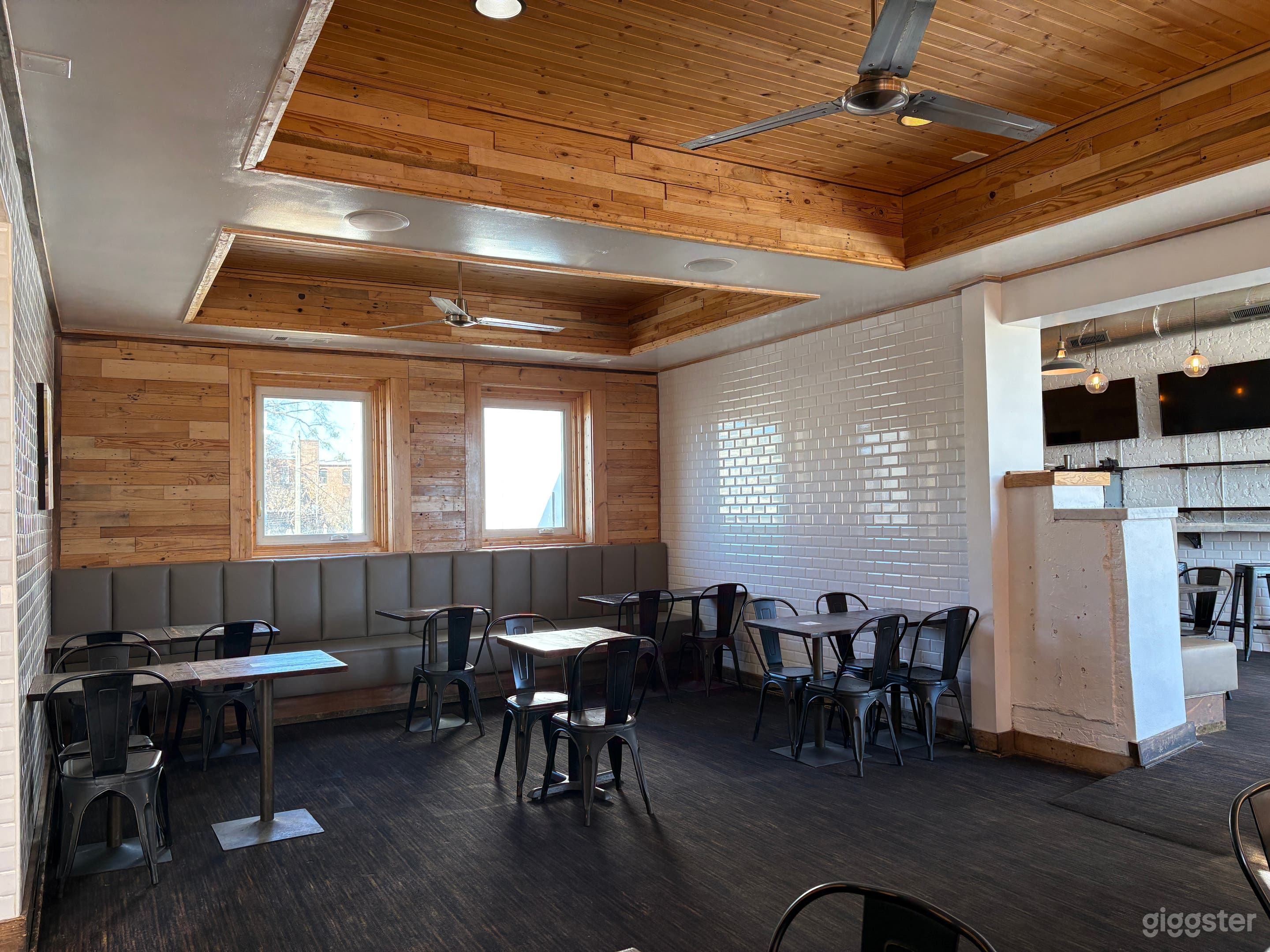 Modern Restaurant & Bar with Murals, Natural Light Photo 3