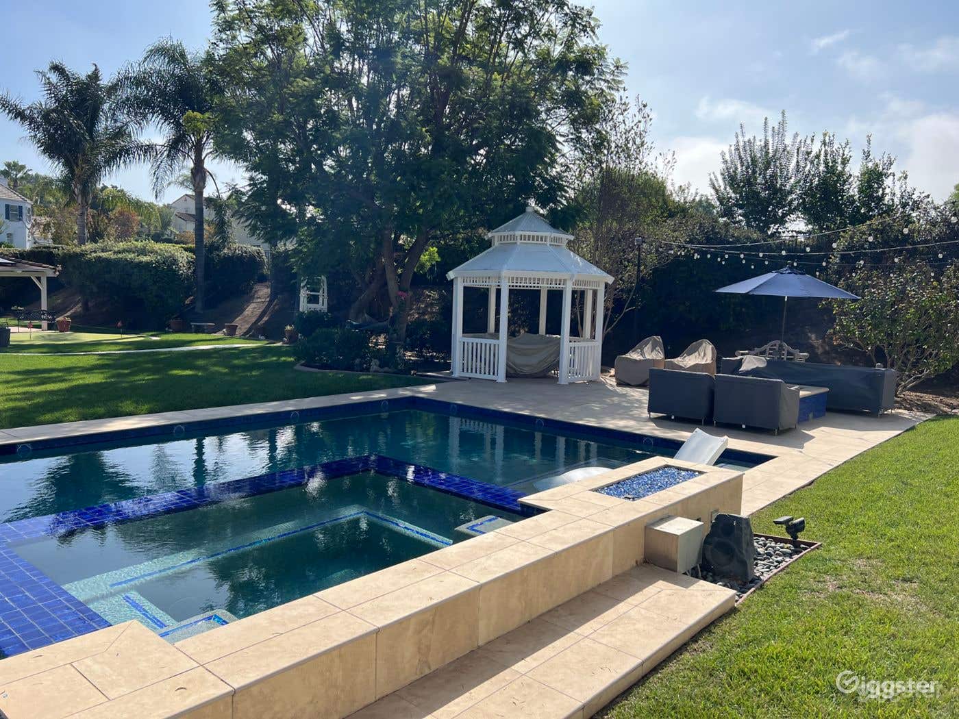 Astonishing Pool with Gazebo and Lush Yard Photo 1