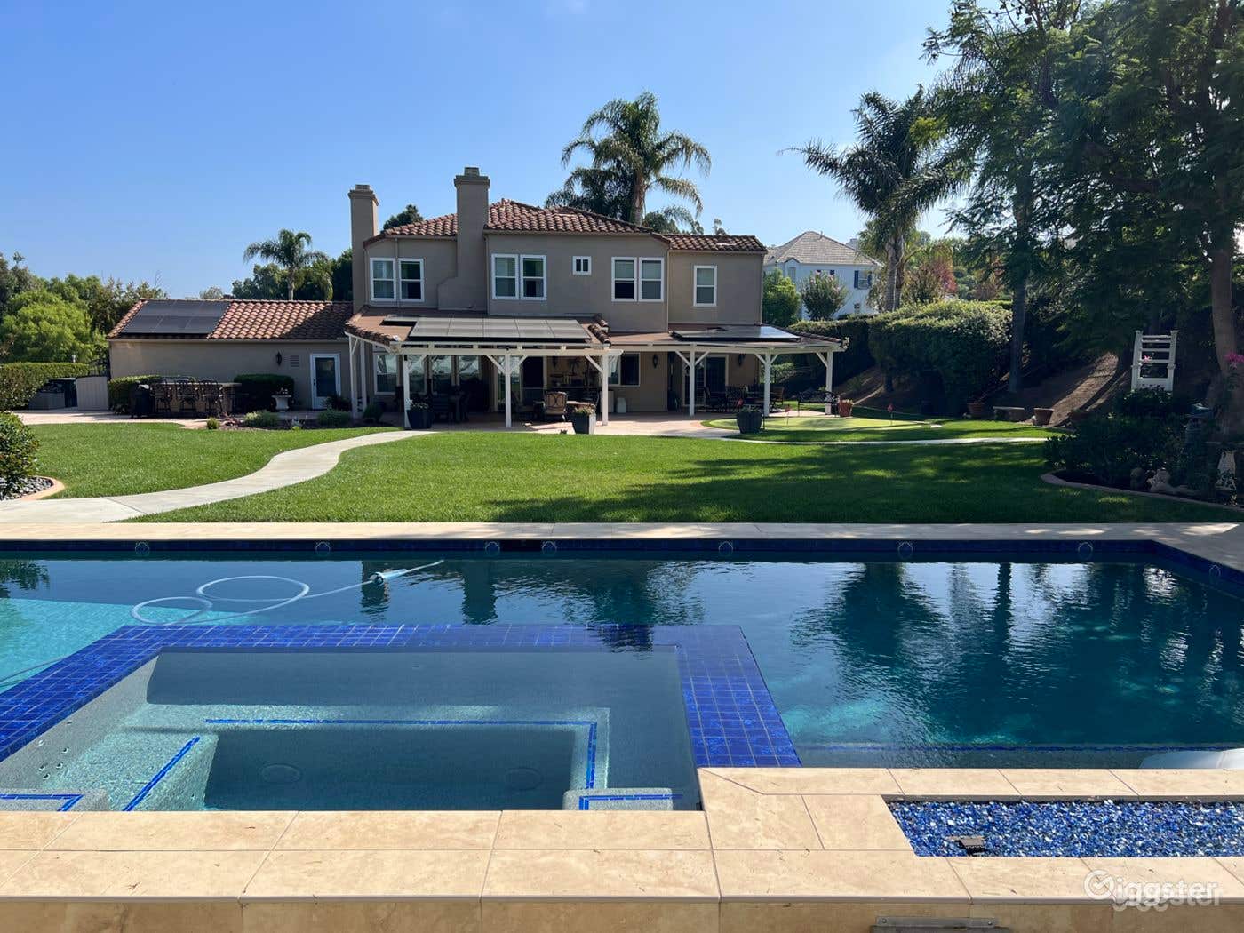Astonishing Pool with Gazebo and Lush Yard Photo 3