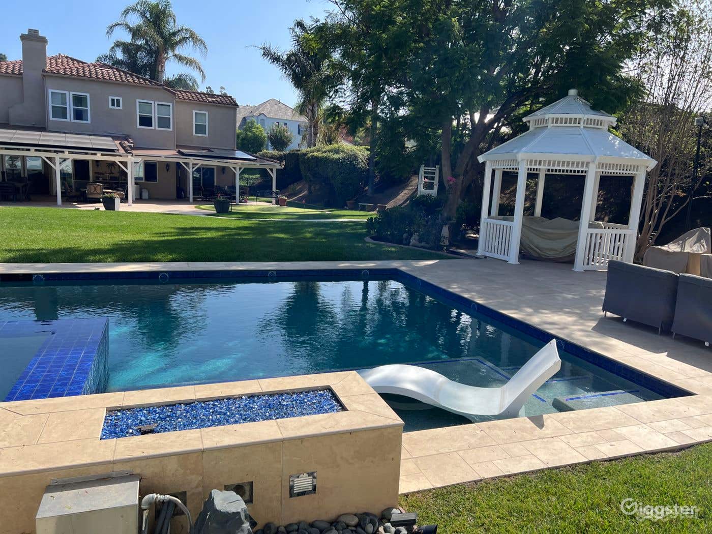 Astonishing Pool with Gazebo and Lush Yard Photo 2