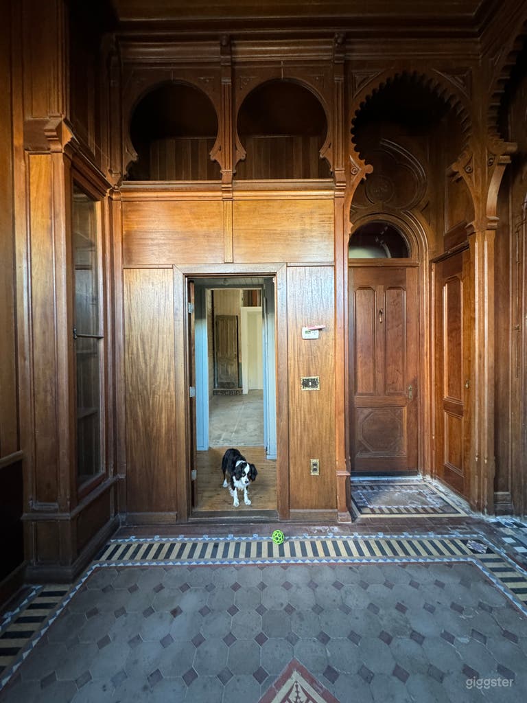  View of Tack Room and original tile floor to doorway to bathroom and food prep area 