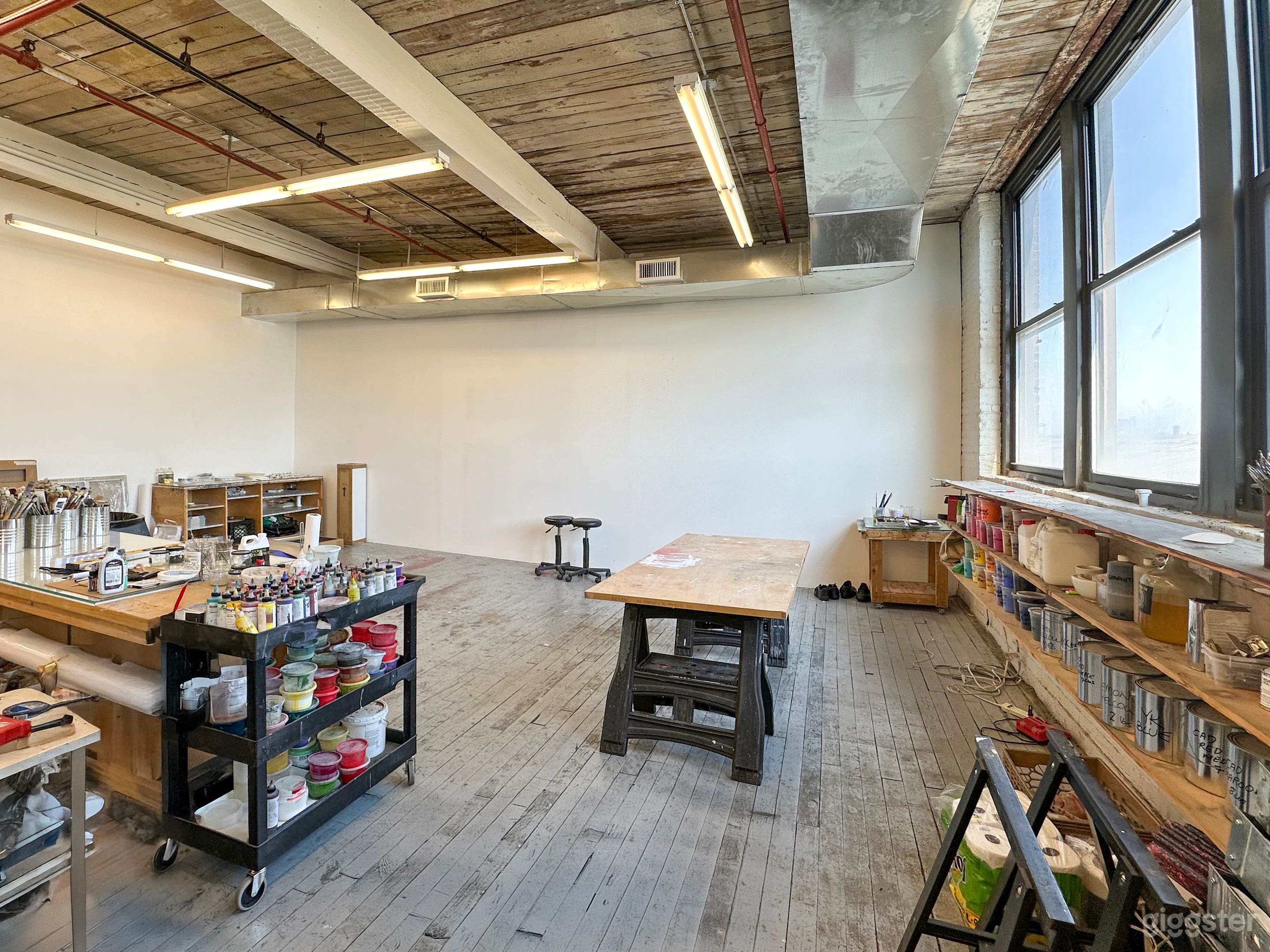 Bohemian artist studio in Gowanus. paint on floor Photo 2