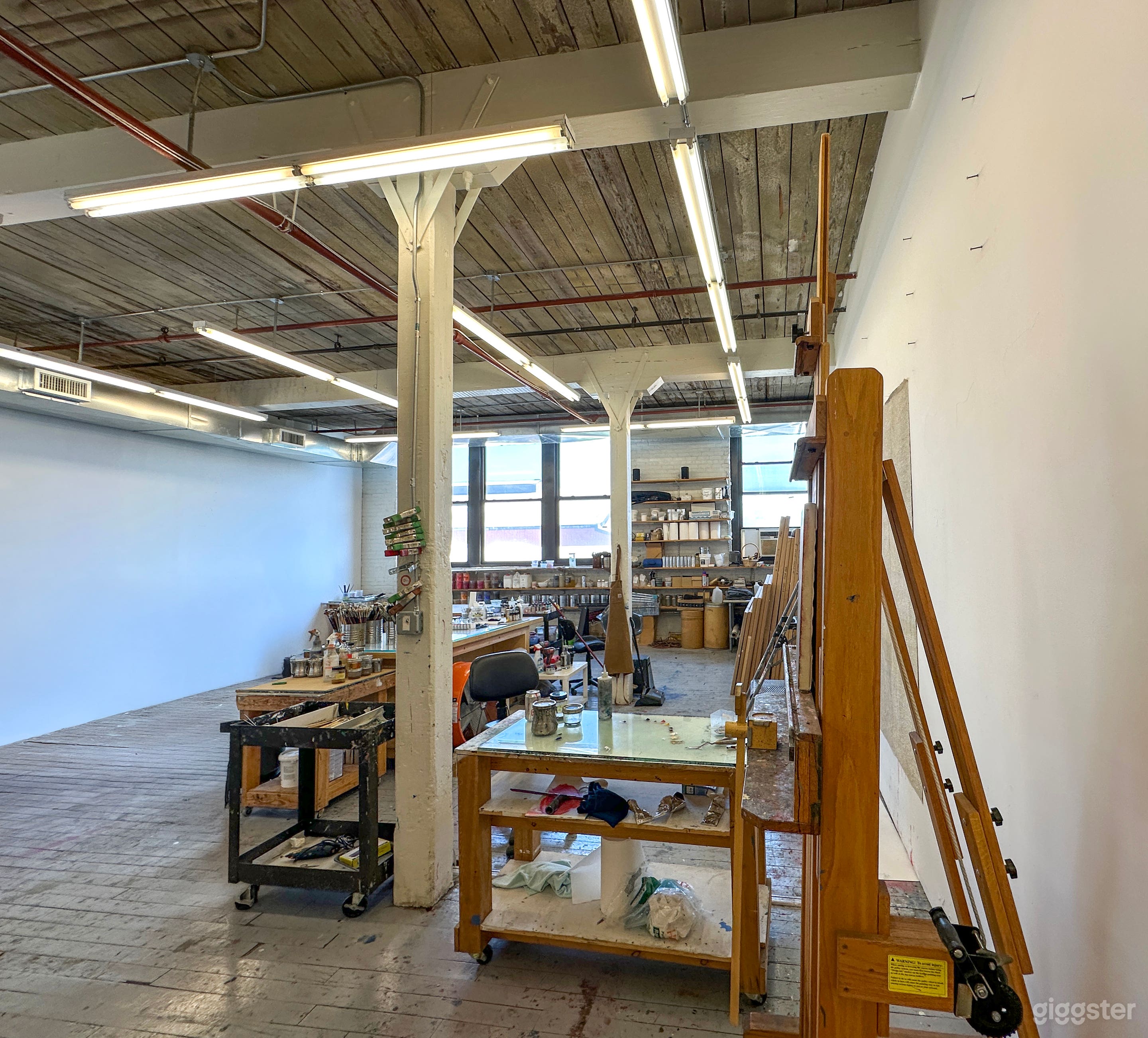 Bohemian artist studio in Gowanus. paint on floor Photo 4