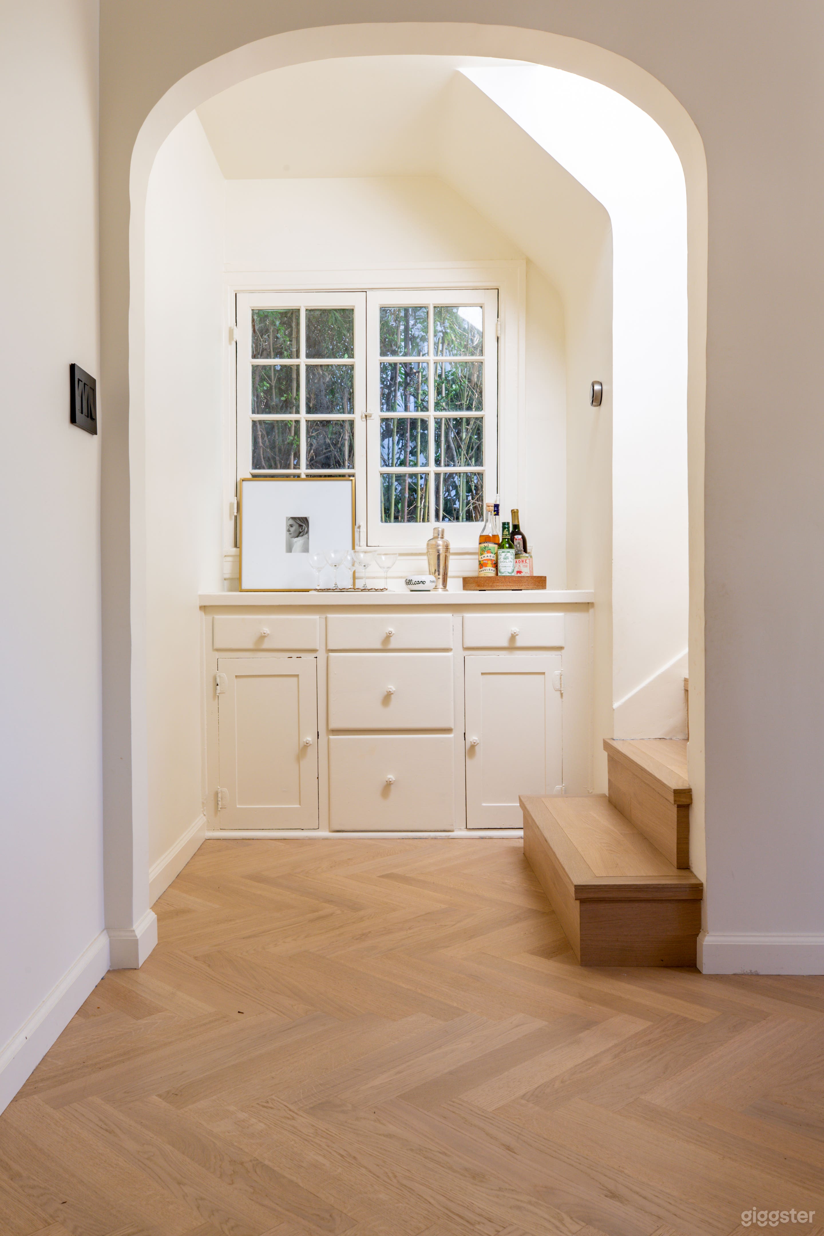 Bar nook. Original 1920s windows.  White-oak Herringbone floors throughout entire home.