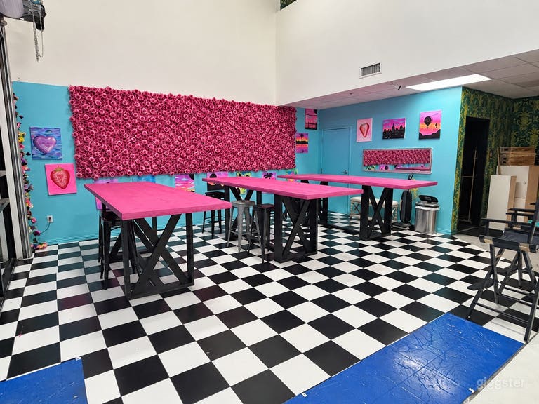  Pink Event Space with Three Tables & White Cyclorama 