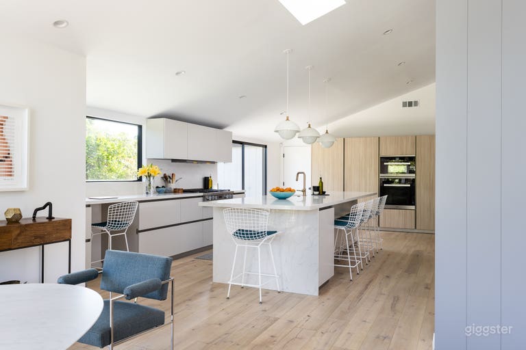  Kitchen with workspace area and large island. 