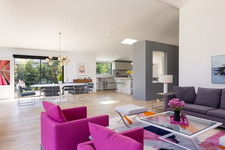  Large living area. Floating grey clad tower that divides the spaces but allows easy flow and access.   