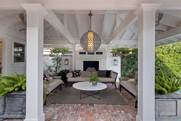  Outdoor room in backyard functions as an additional family room.  Includes pool bath, steam room and custom lighting 