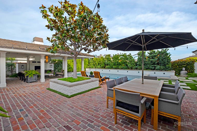  Backyard includes a large outdoor room with fireplace, bath and steam room, dining area, turf play area and a 35&#x27; x 17&#x27; pool and 8&#x27; x 8&#x27; jacuzzi 