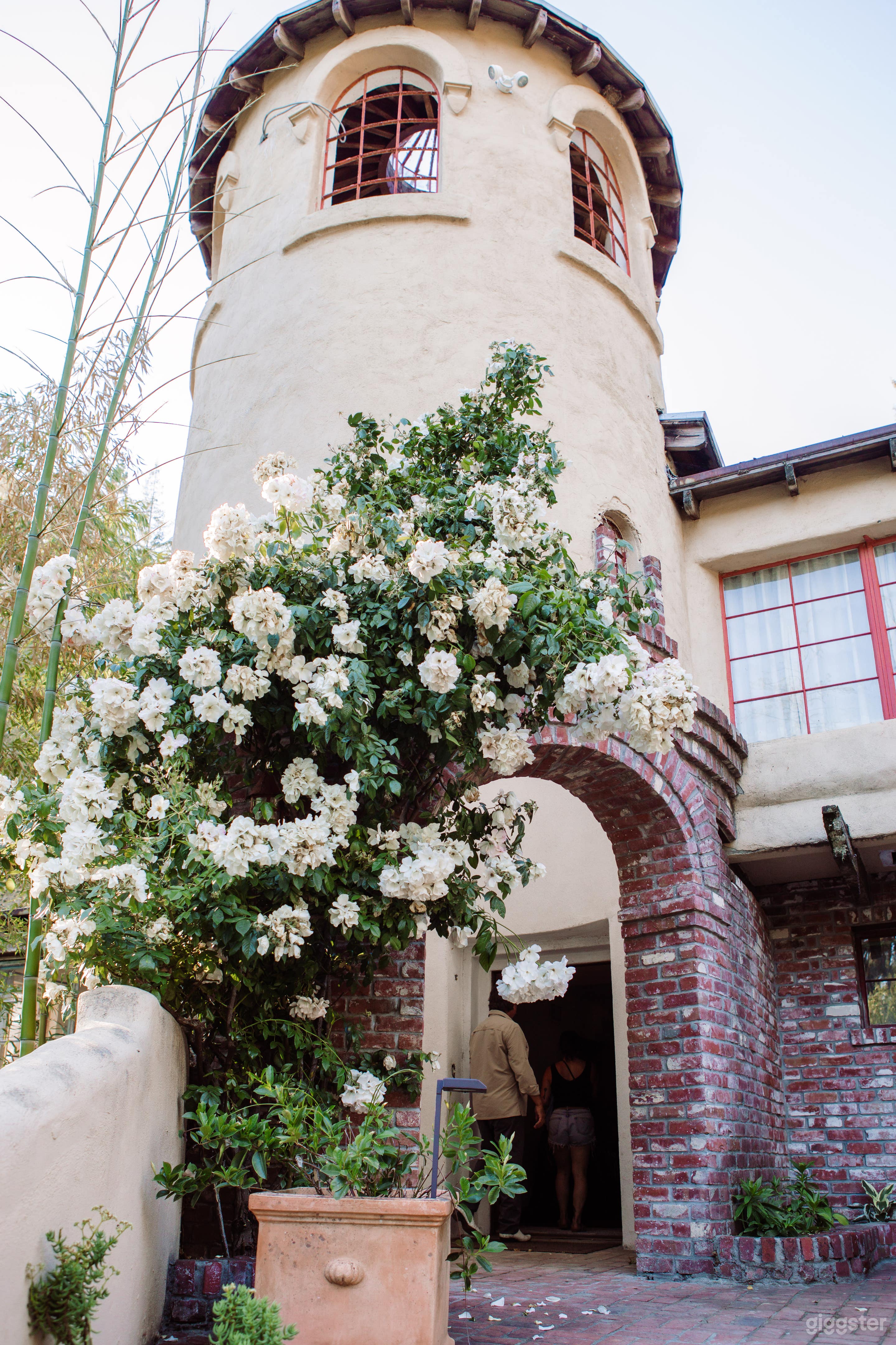 The tower entrance to the Castle House, built in 1938 in the mission style, and then enhanced in the 70's with a front facade in the Spanish and Mediterranean style.