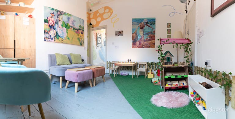  Kid-Friendly Play Area: A safe, engaging space filled with toys, imaginative setups, and natural elements for little ones to explore. 