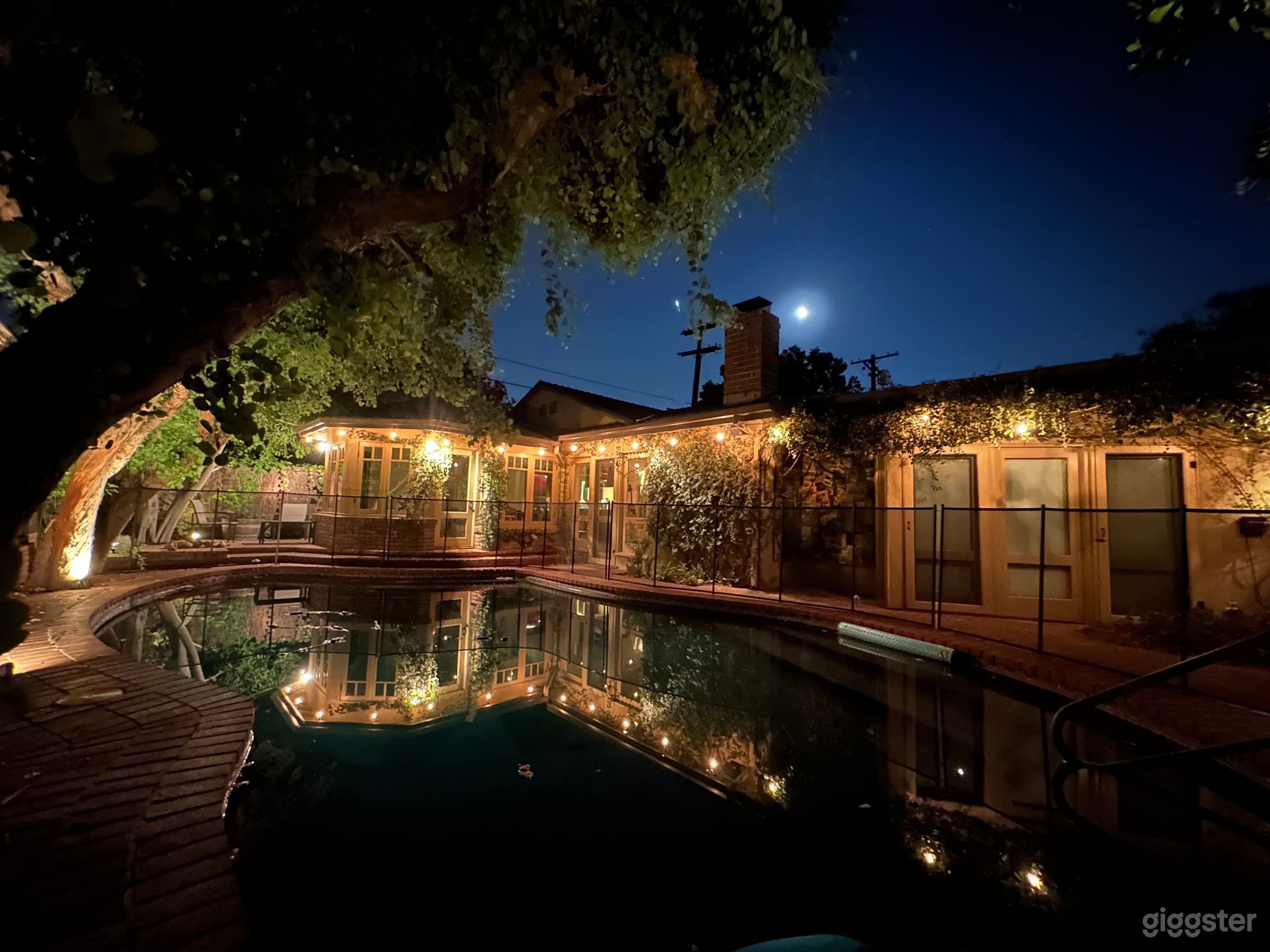 Exterior shot from backyard, pool fence is removable.