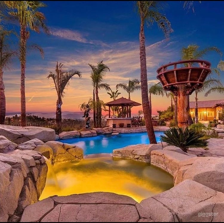 Lagoon-Style Treasure Island Pool  Photo 1