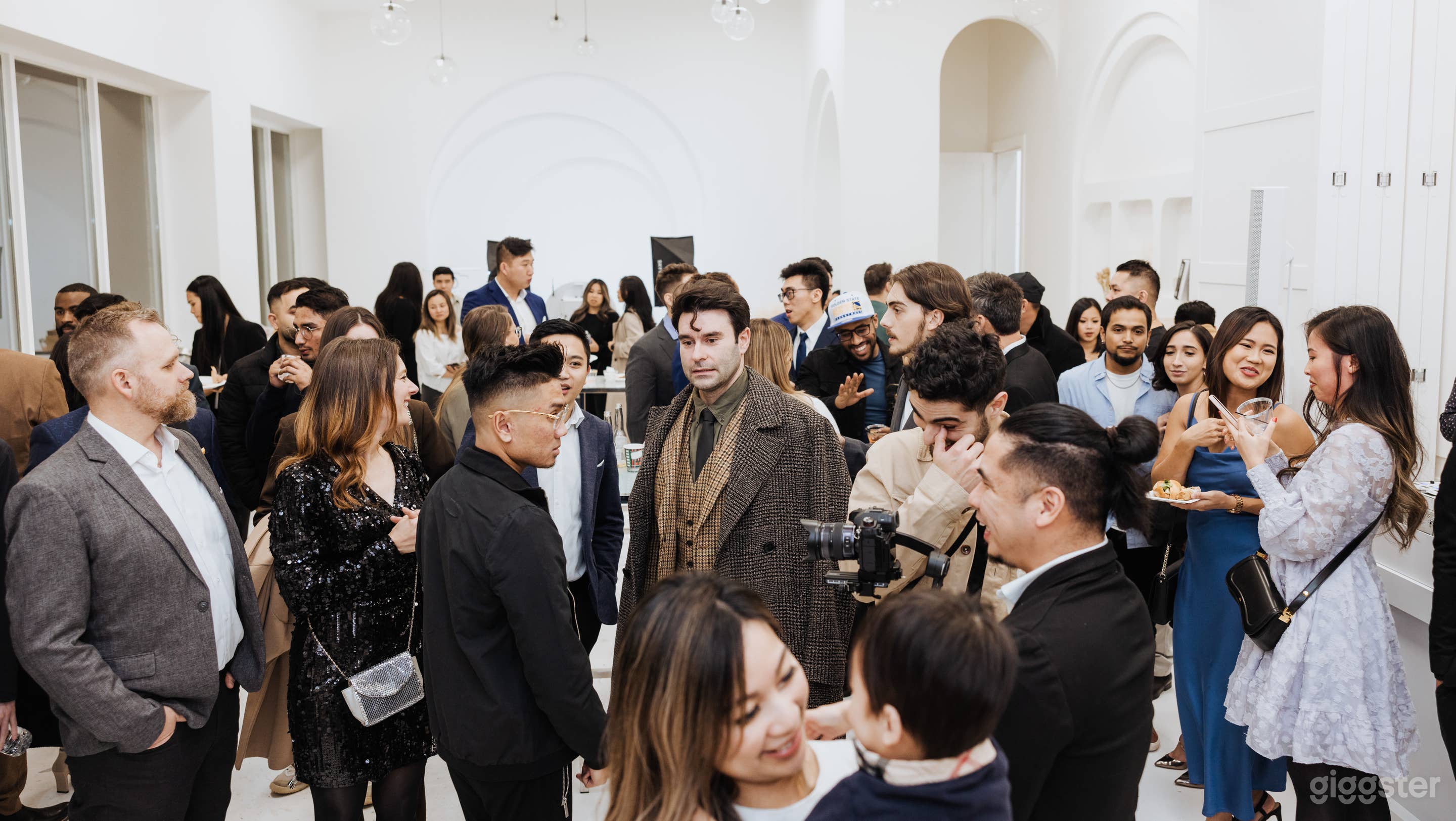 Host your next event in style! Our stunning high-ceiling and chic event space comfortably accommodates 50-60 guests, making it perfect for intimate gatherings, weddings, and special celebrations.  