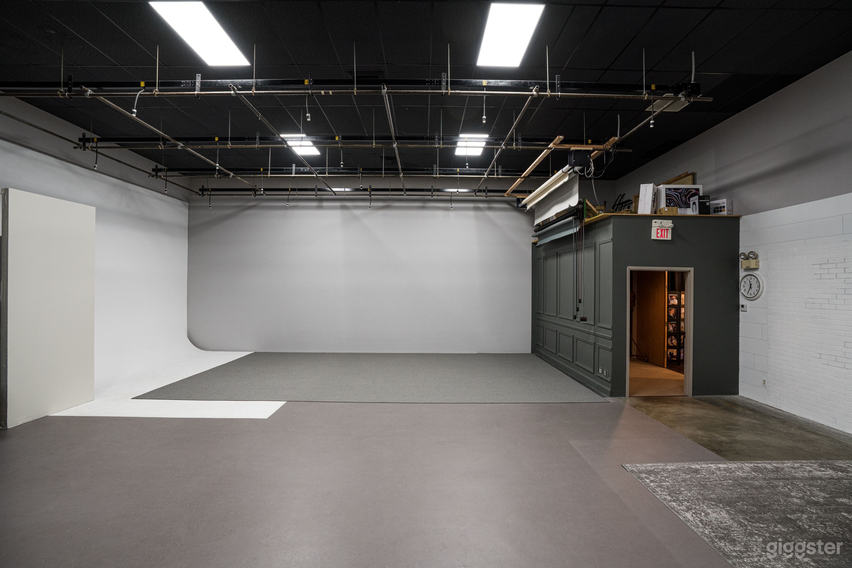 Main studio view.  17' wide white cyc wall is on the left.  
Note: Floor is covered with gray carpet that can be moved to reveal more of white floor.  There are no windows in the studio.