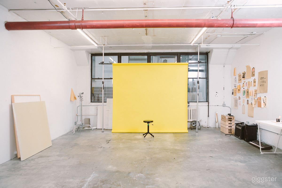 Studio shown with a 9' seamless. You can also use a 12' seamless in this space.