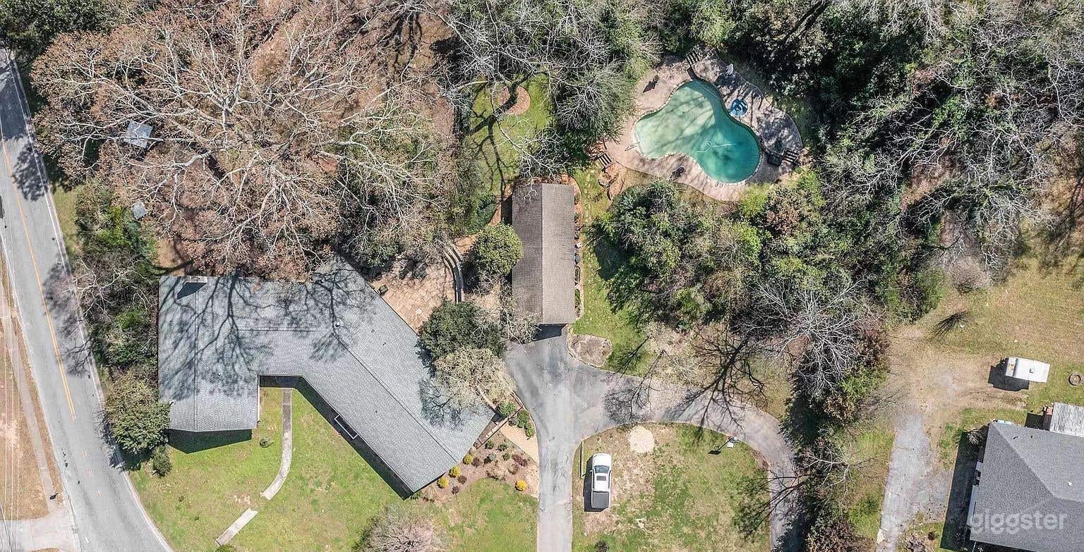 Elegant Mid-Century Pool Escape in Hampton Photo 4
