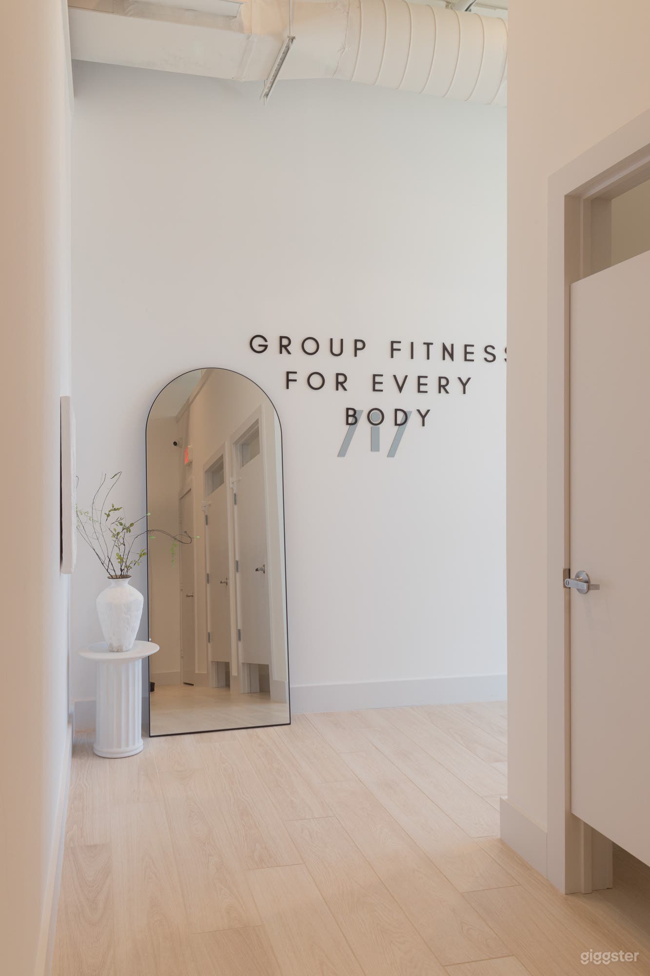 Modern Boutique Fitness Studio with High Ceiling Photo 4