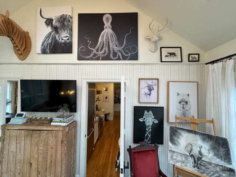  Sunroom with animal wall. Door opens up to porch as well 