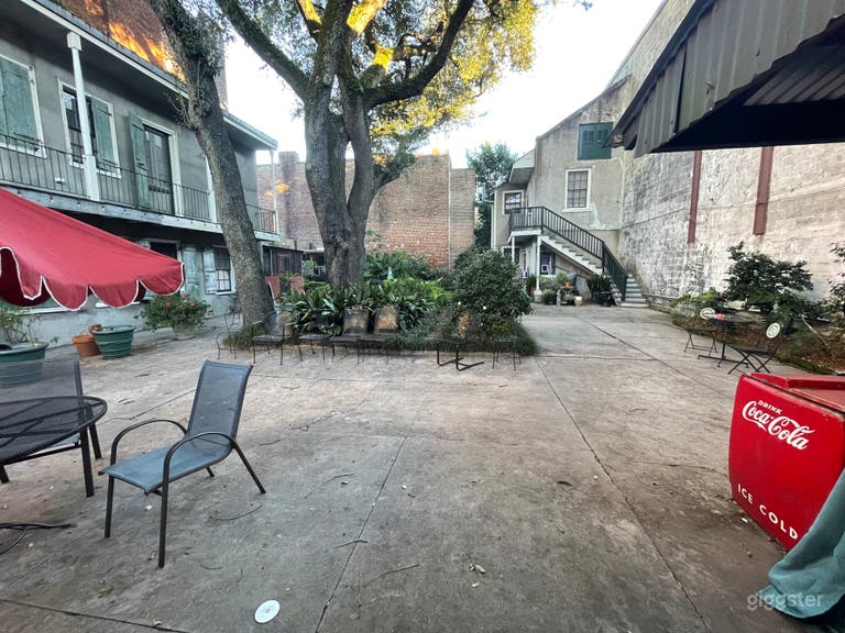   Coutyard and out building backdrop. this is your chabby chic view w one back brick wall, chicken coop backdrop, oak  trees, textured cement wall to left +++  Fill up that coke machine to the brim, add a buffet or workshop table or 2 and Voila! 