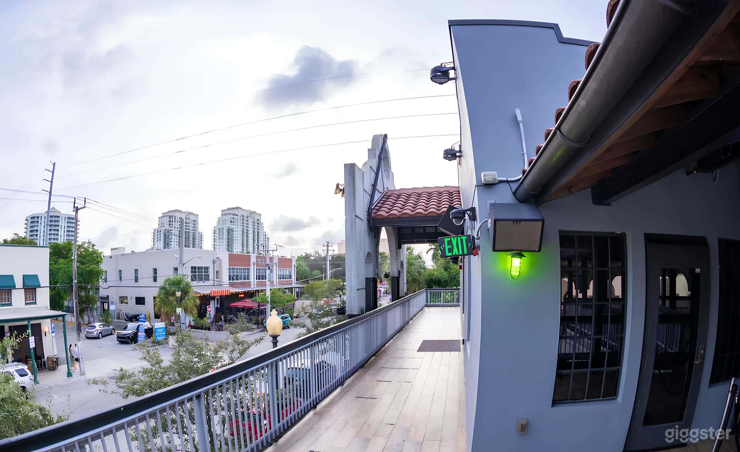 Modern Rooftop Lounge with City Views Photo 1